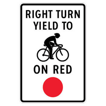 right turn yield to cyclist on red