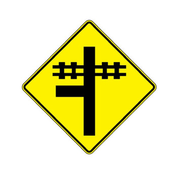 warning for “t” intersection in advance of railway crossing
