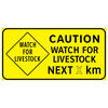 caution watch for livestock next ( x ) km