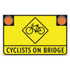 cyclists on bridge